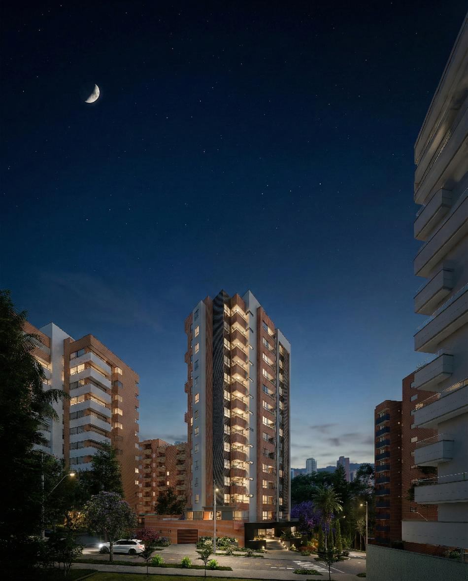 Conjunto residencial nocturno bajo la luna